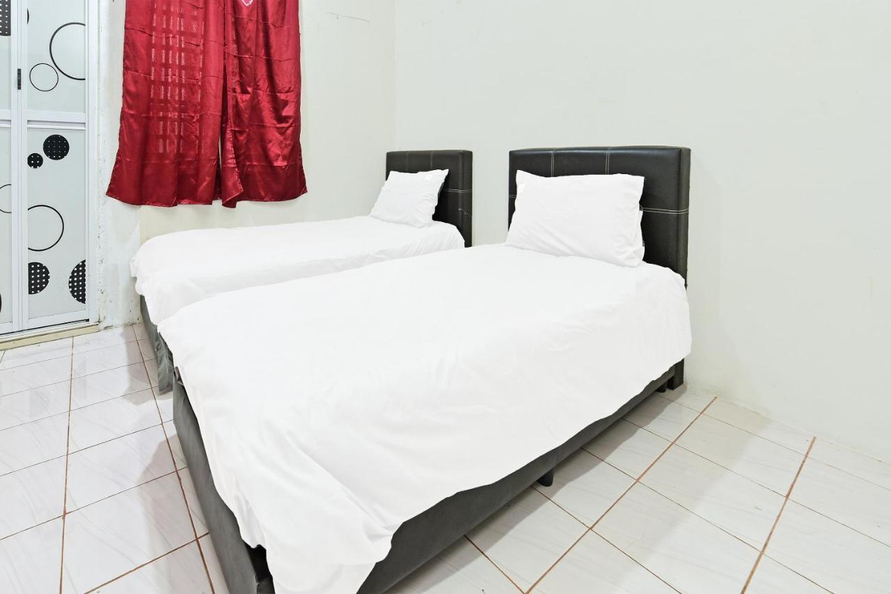Oyo 90596 Casaria Inn Paka Экстерьер фото