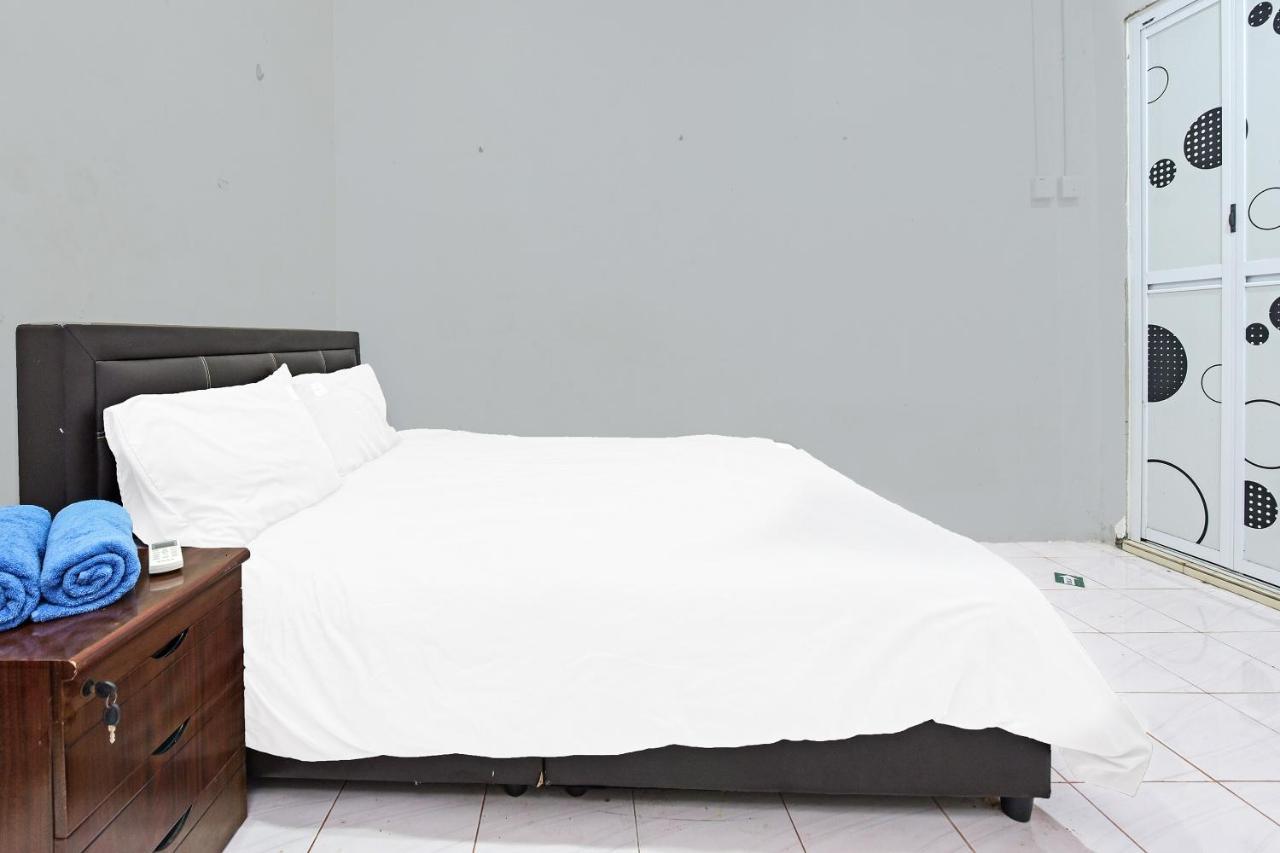 Oyo 90596 Casaria Inn Paka Экстерьер фото